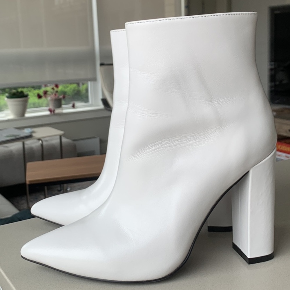 White leather boots with 4-inch heels